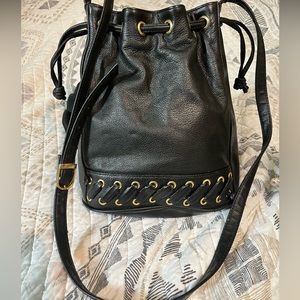 Black leather pull tie bucket purse